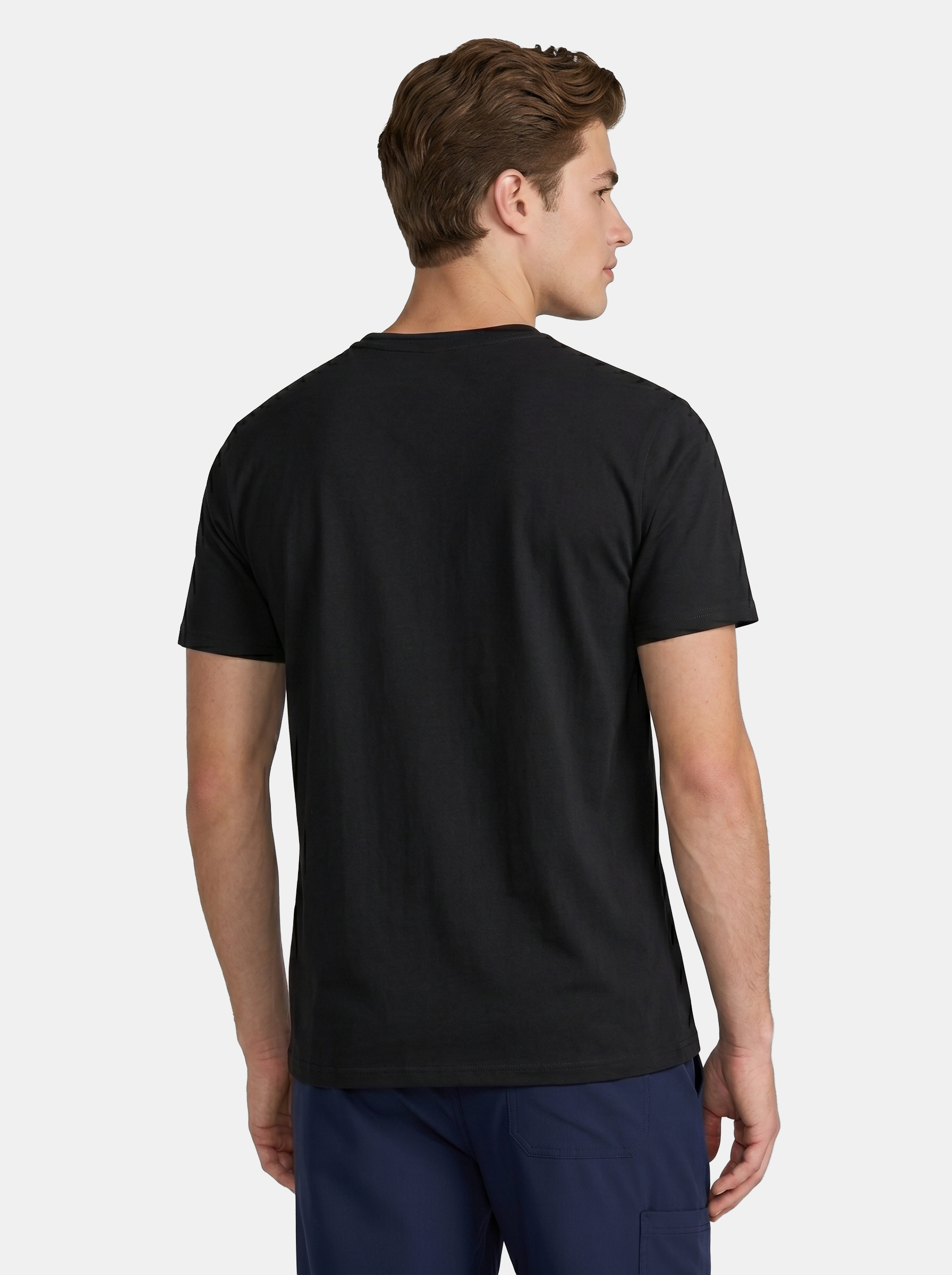 Man wearing a black t-shirt on a light gray background